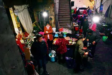 万佐成夫妇,“抗癌厨房”18年不打烊2