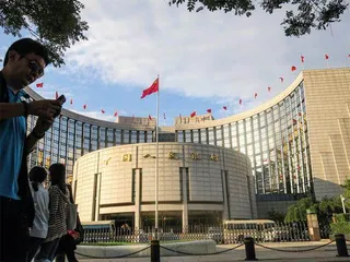 潘功胜:央行买卖国债不代表量化宽松1