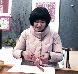 传承剪纸艺术 剪出满园芬芳1