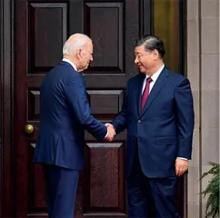 时隔一年，中美元首再握手