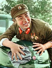 一幅幅珍贵照片，温暖和激励了一代代国人