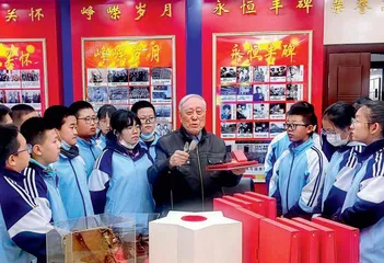 打开“红色宝典”  助力全民国防教育