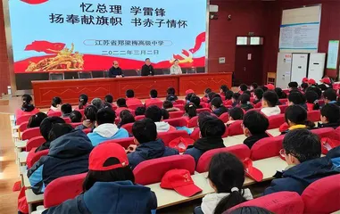 扬奉献旗帜 书赤子情怀