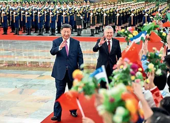 习近平同乌兹别克斯坦总统米尔济约耶夫会谈