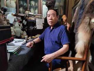 贾平凹：狮子暂坐草丛