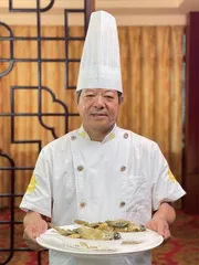 一尾河豚，“鲜活”一城