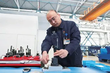 秦世俊：精品与废品只差0.01毫米