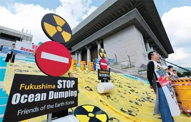 民众上街反排放,韩国大办海鲜节2