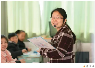 老师笑了