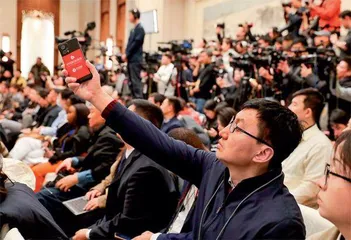 周刊记者跑两会