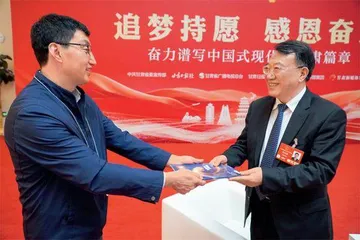 周刊记者跑两会5