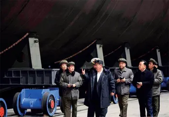 金正恩登上“神秘舰船”