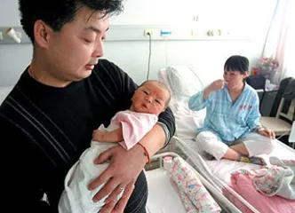 迟到了4年的“第13亿公民”