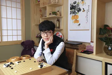 ​柯洁：人不轻狂枉少年